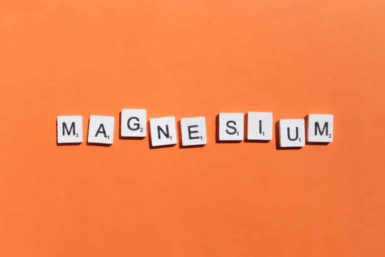 magnesium scrabble letters word on a orange backgr 2023 11 27 05 29 15 utc